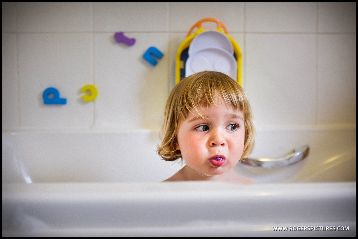 toddler girl in the bath