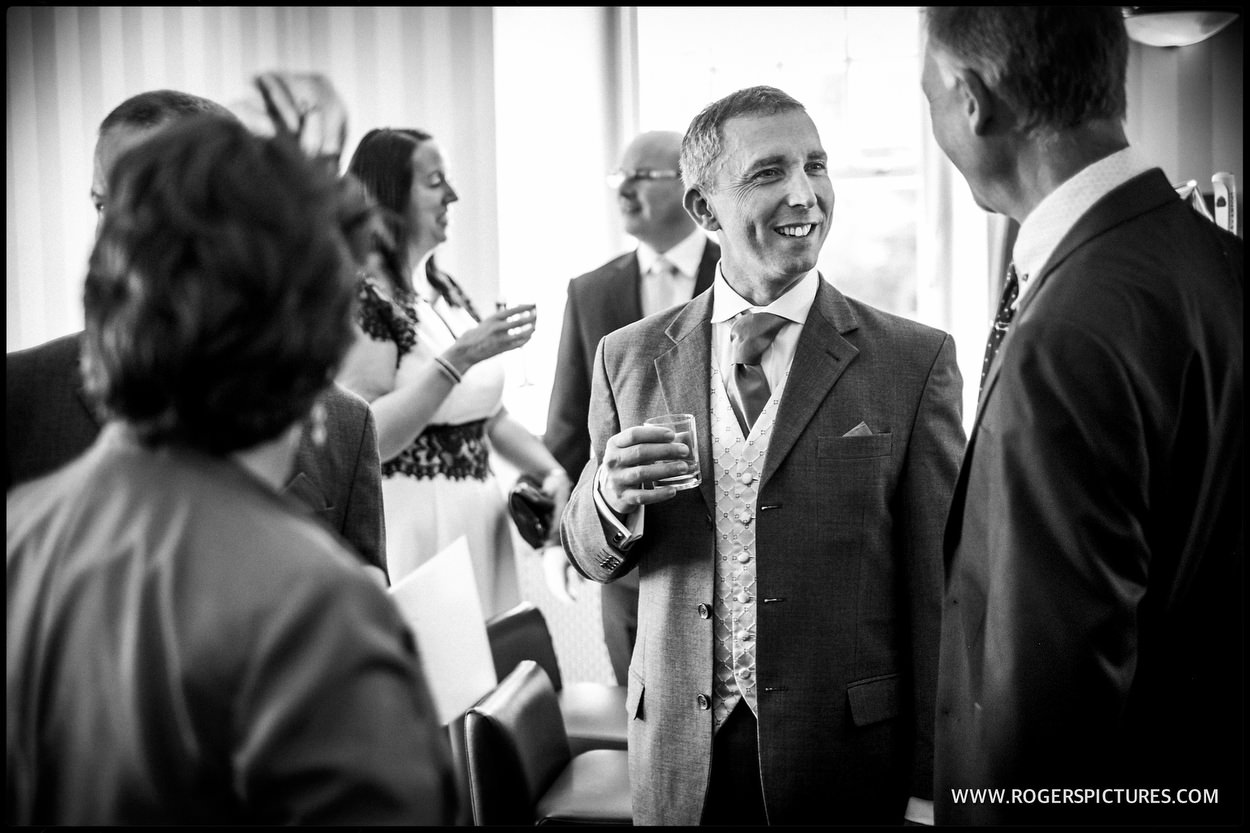 Groom and best men in the bar at Gorse Hill before a wedding