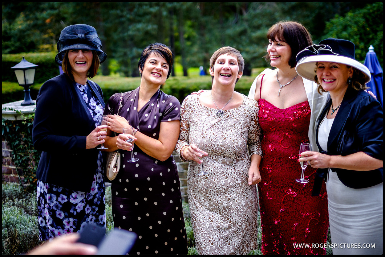 Wedding guests enjoying a reception in Surrey