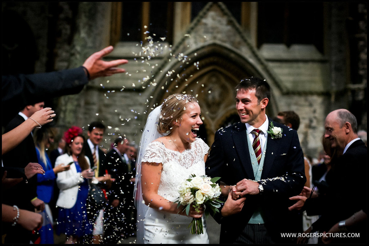 Happily married couple in confetti in Kensington