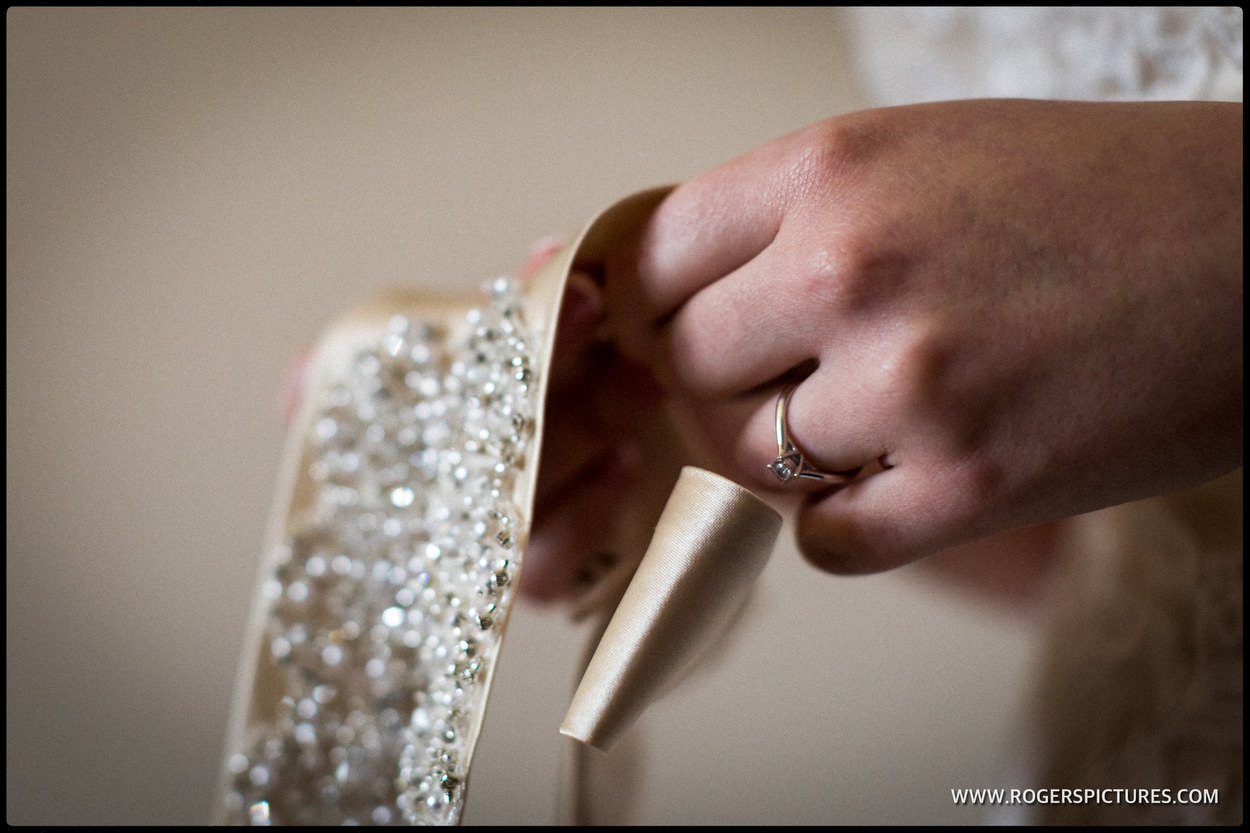 Detail photographs of brides wedding belt