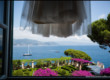 Wedding dress hanging in front of Portofino
