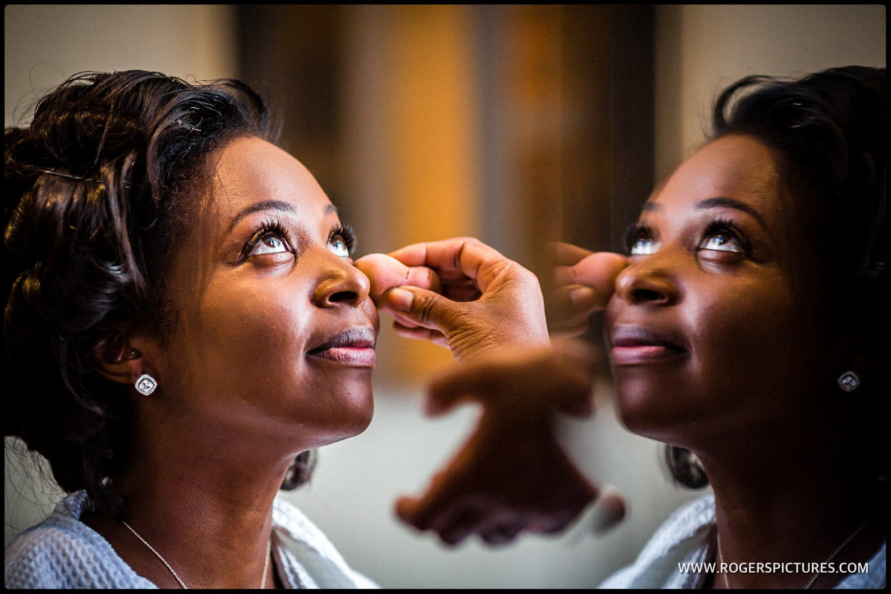 Bride reflected having make-up applied