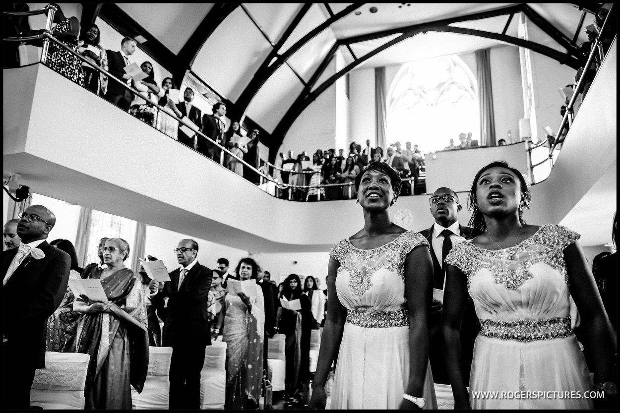 Black and white photo of the wedding ceremony at Kensington Temple