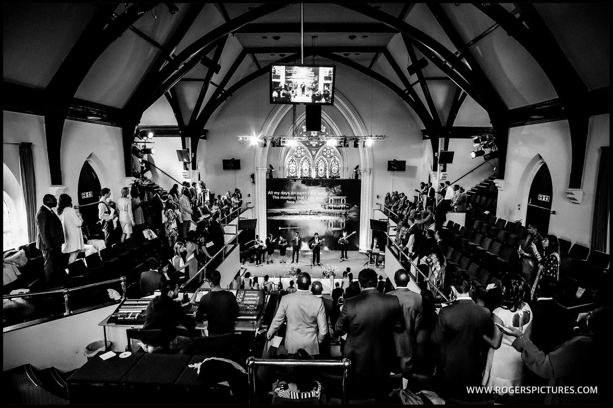 Wide shot of Kensington Temple during a wedding service