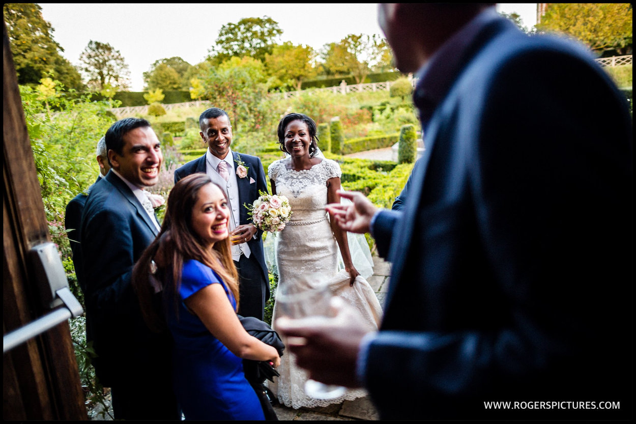 Bride and groom in Hatfield house Gardens