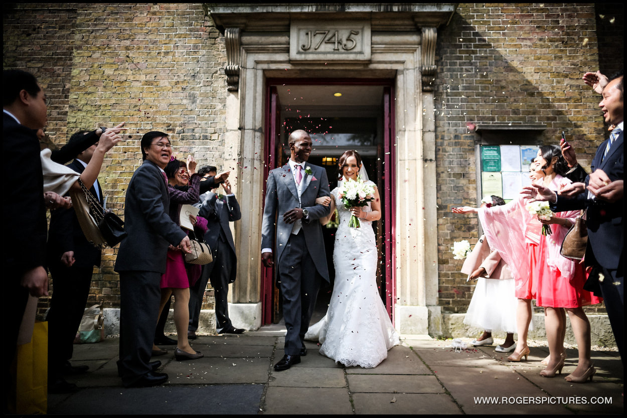 Bride and groom leave North London Church
