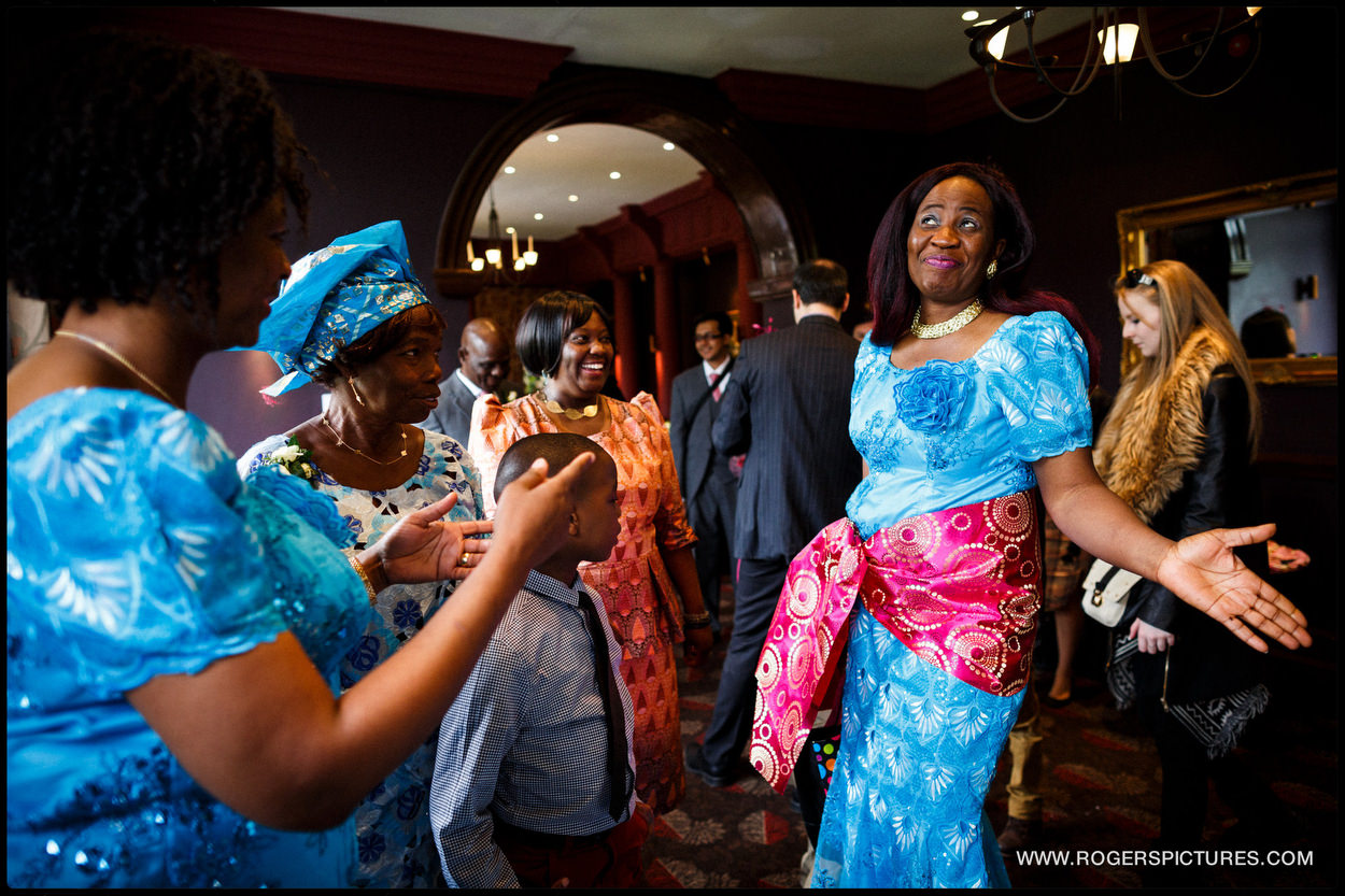 African ladies dancing at a wedding in North London