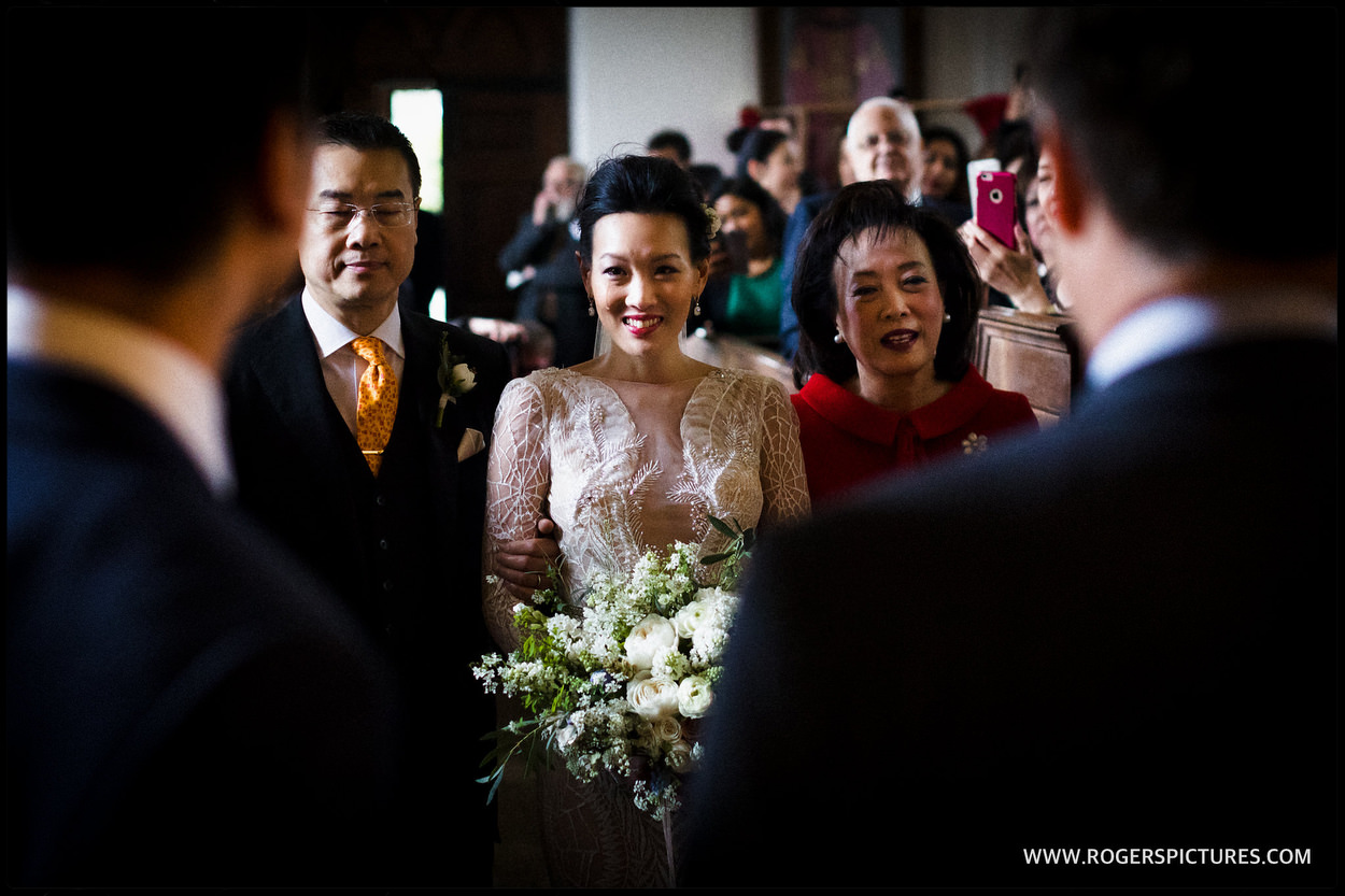 Bride cries as she walks down the aisle at Babington House wedding