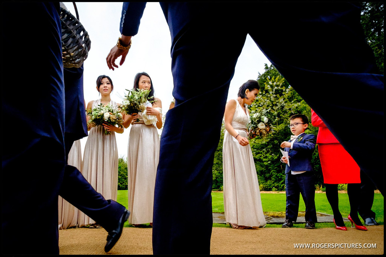 Bridesmaids wait to throw confetti