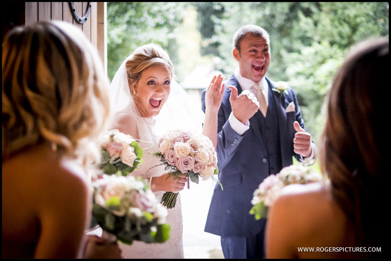 Happy bride is greeted at church door