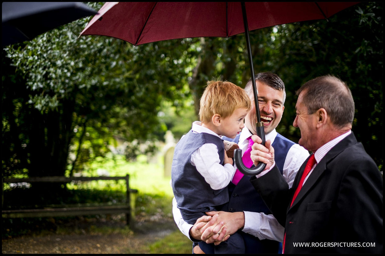 Wedding guests in the rain