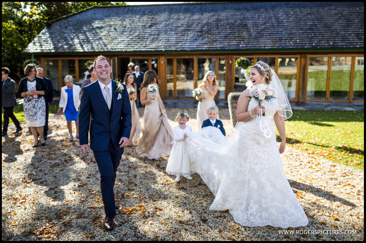 Husband and wife outside the garden room at Wasing park