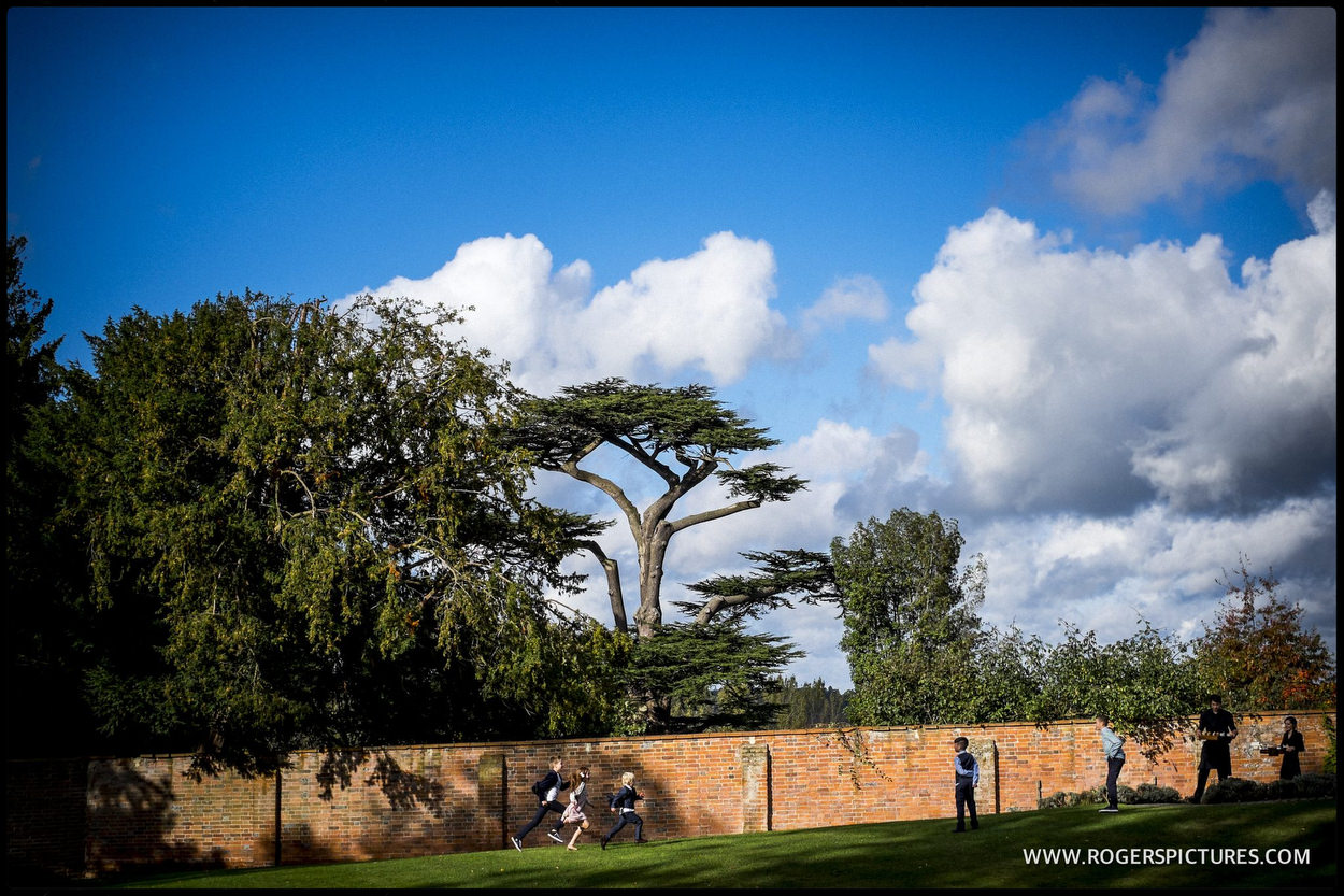 Wedding guests under blue sky