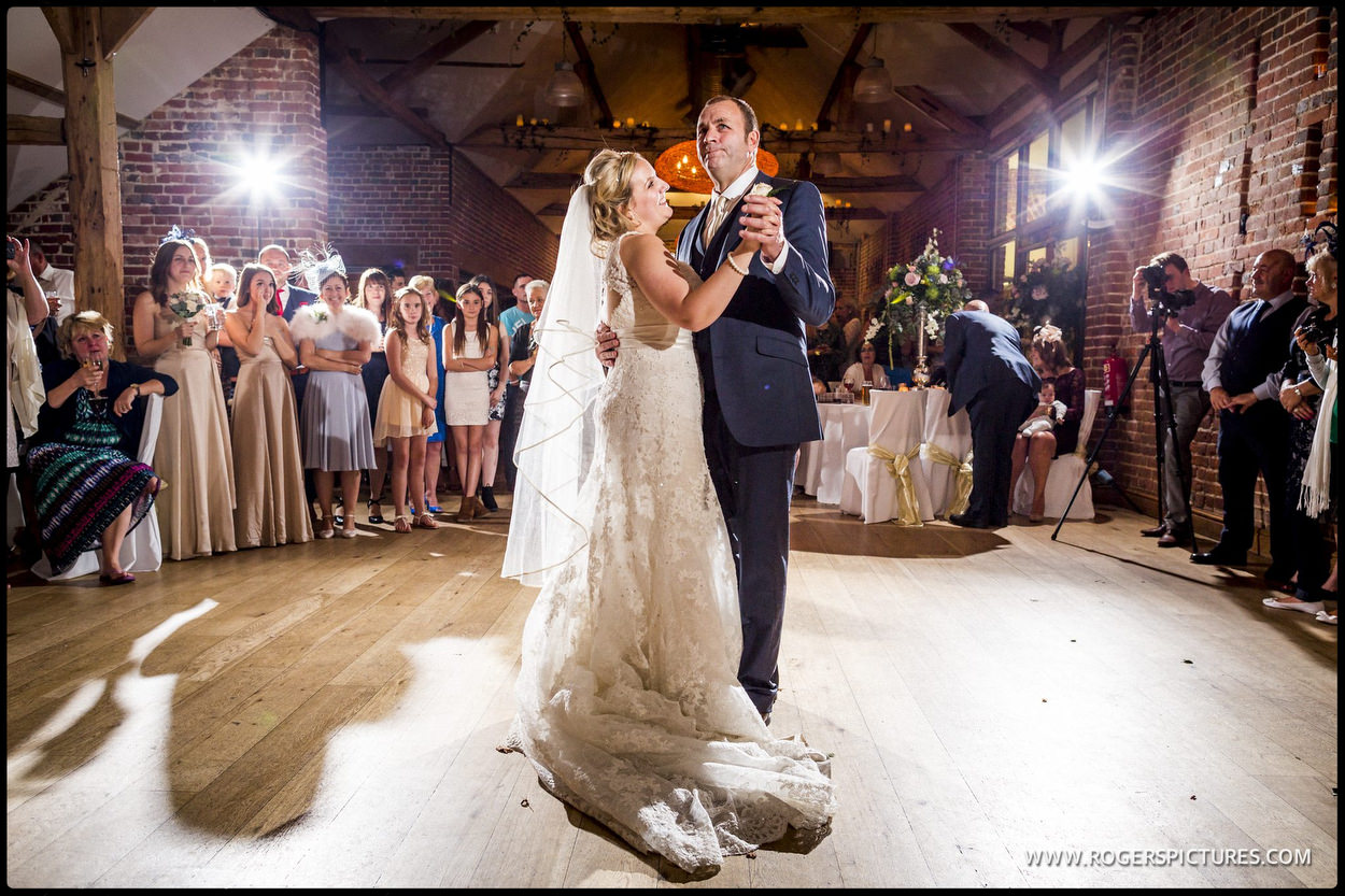 Father dances with his daughter at wedding