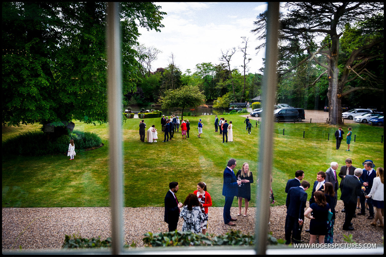 Outdoor guests at SUmmer wedding in Hertfordshire