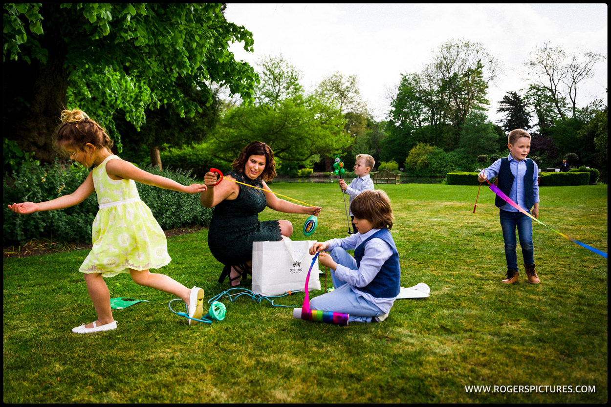 Kids playing in hotel garden after wedding