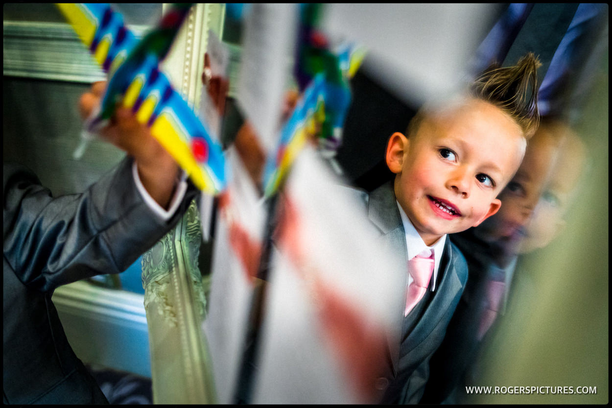 Young boy looking at table seating plan