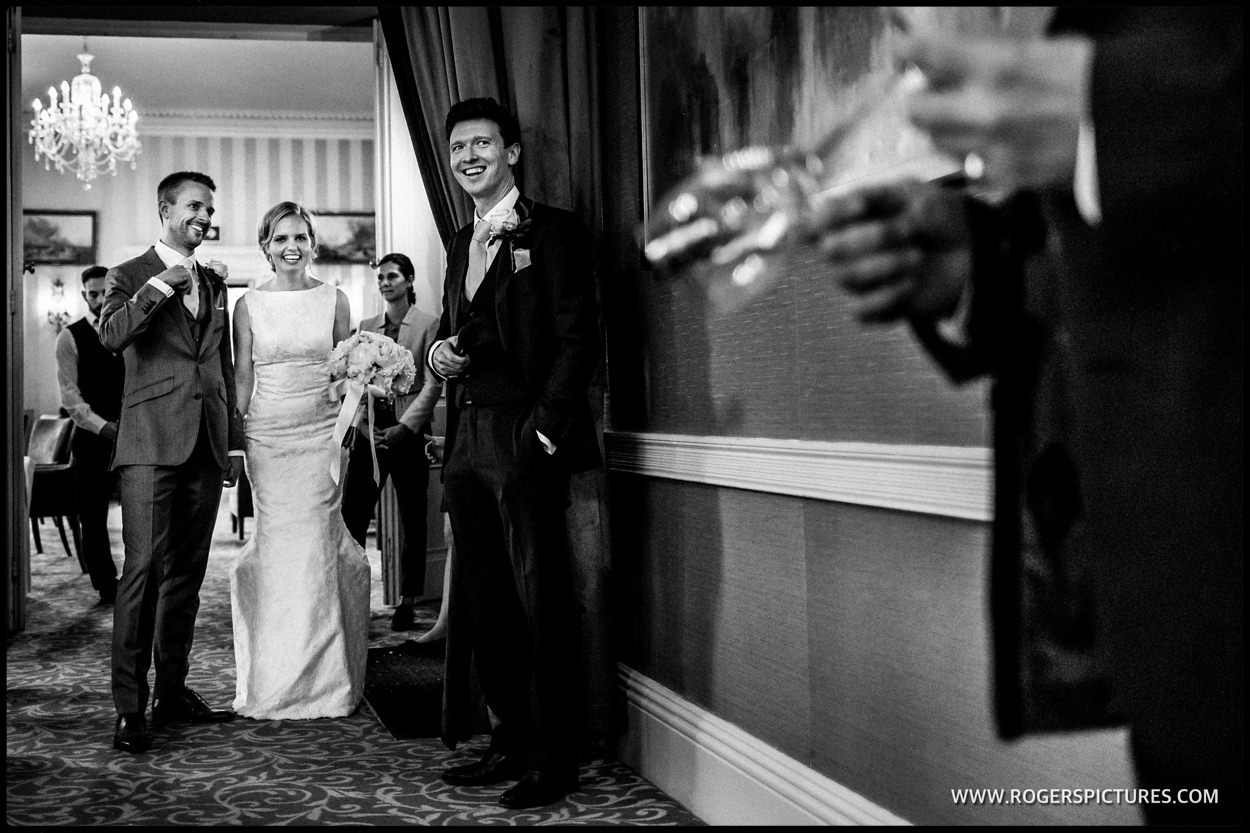 Man and wife waiting to enter wedding breakfast