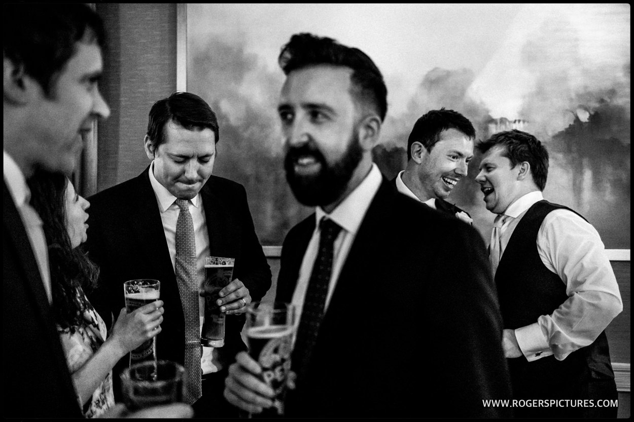 Documentary wedding photograph of guests in St Albans