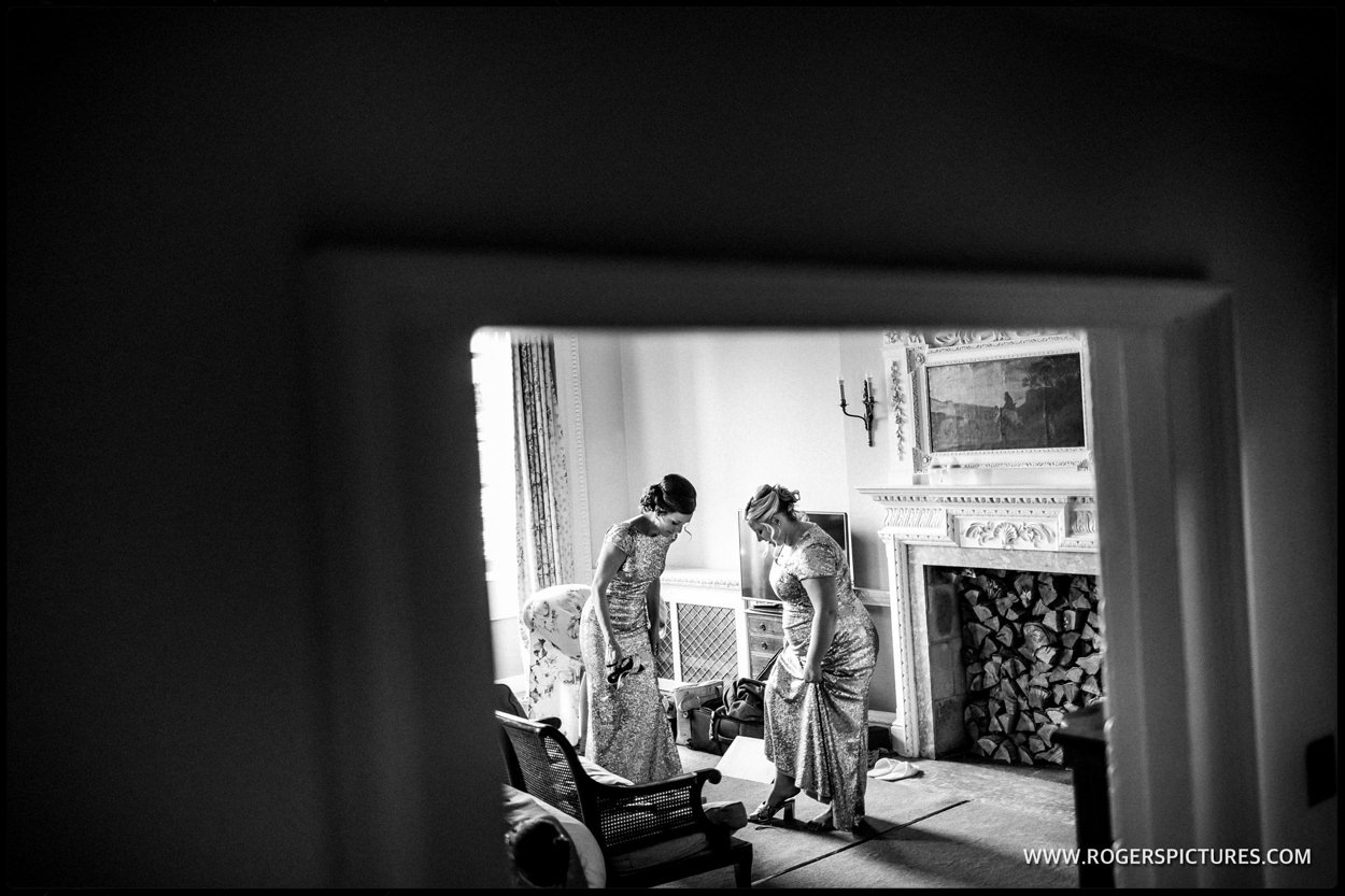 Bridesmaids prepare for the wedding ceremony