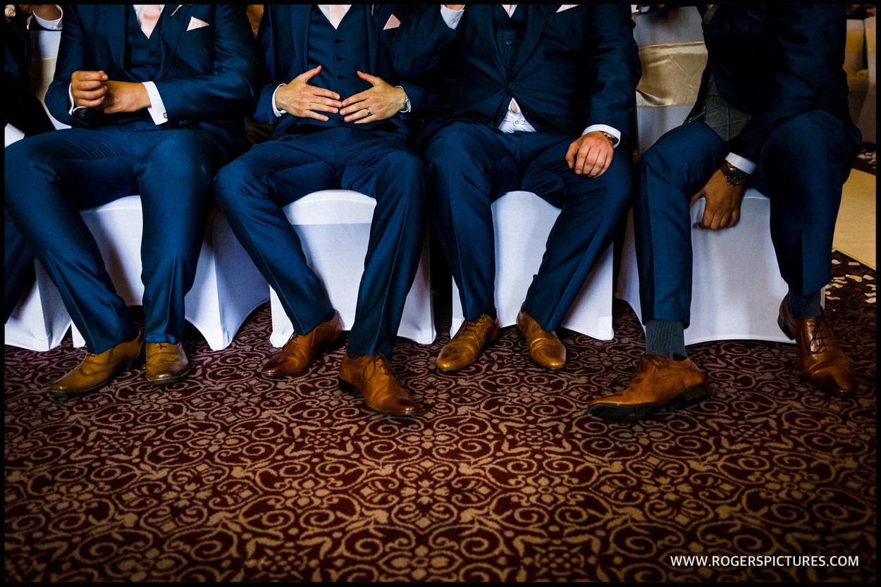 Detail of groomsmen's shoes before the wedding ceremony