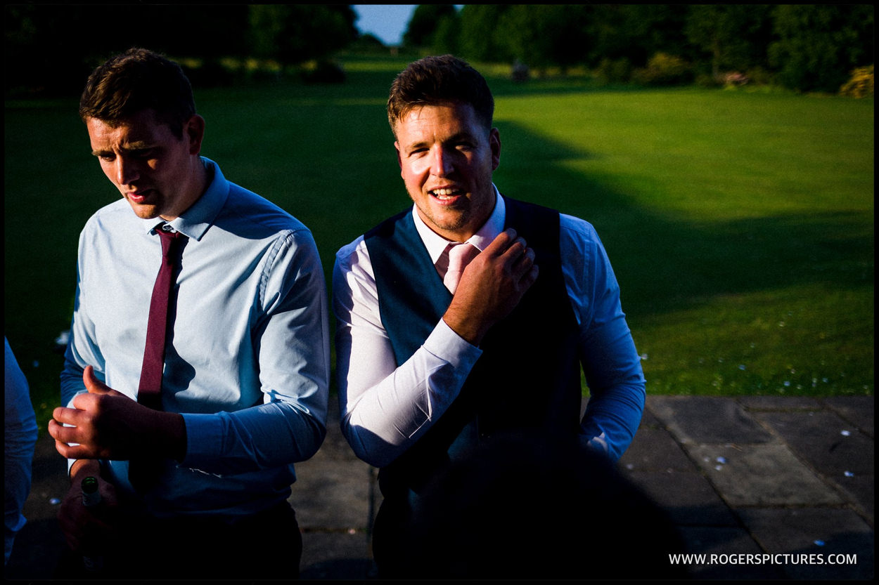 Wedding guests in the evening sunlight