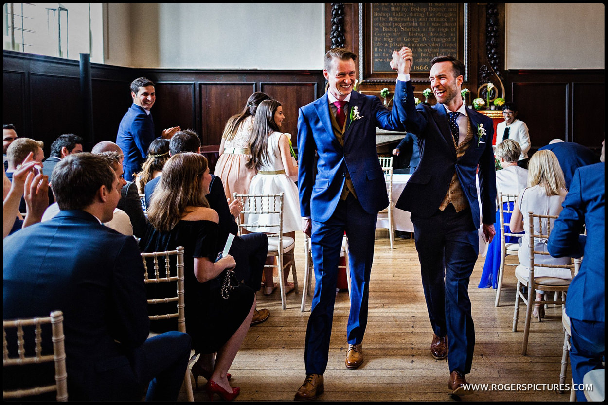 Grooms leave wedding ceremony at Fulham Palace