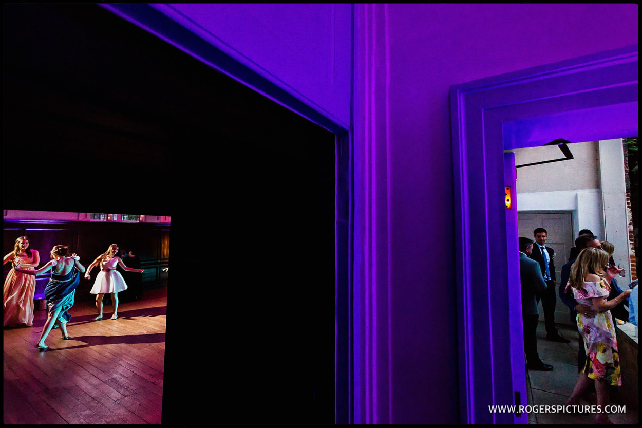 Split composition of the dancefloor at a wedding reception