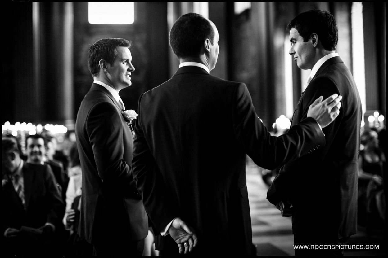 Groomsmen wait for wedding at the painted hall in greenwich