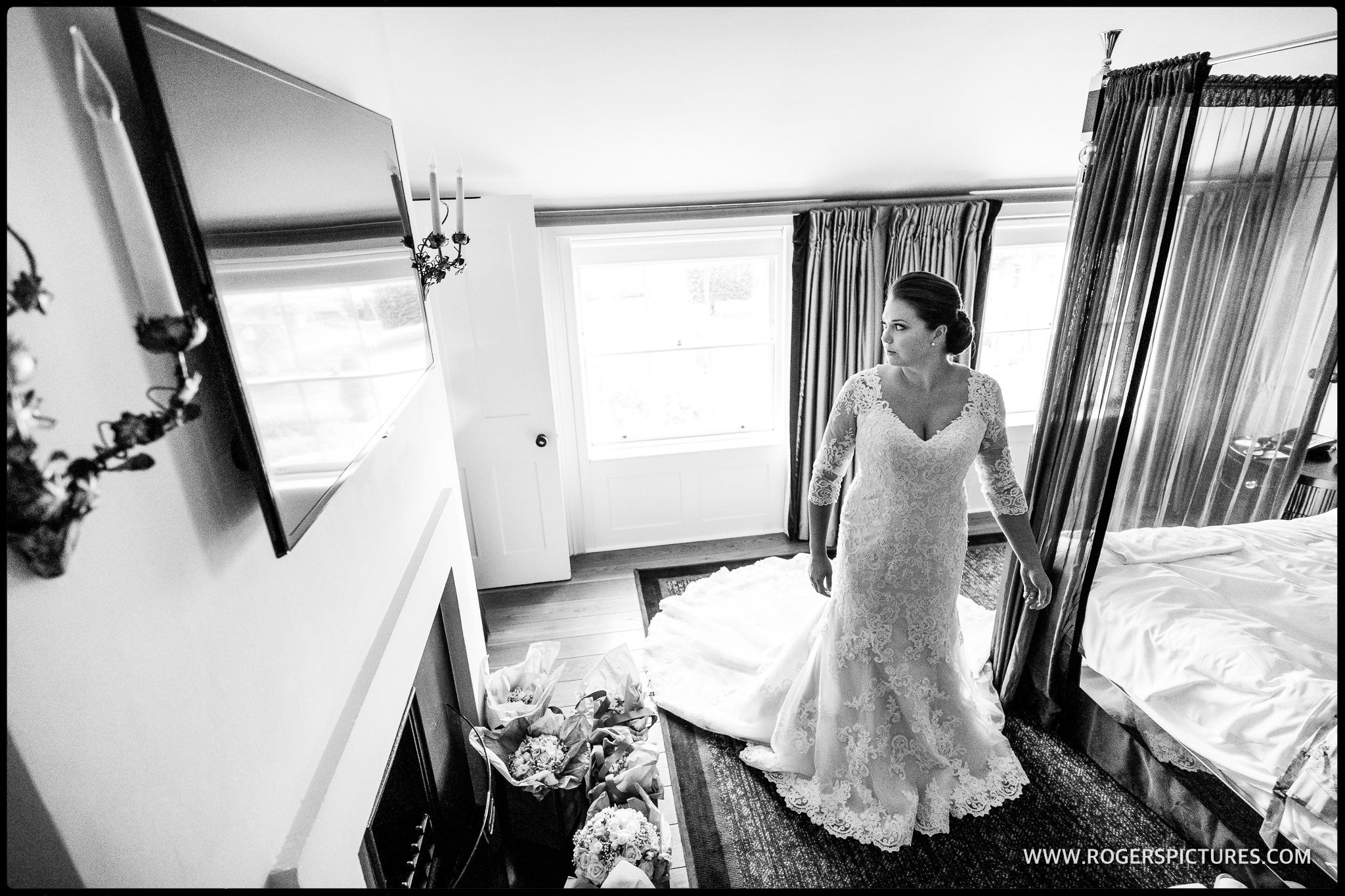 Documentary wedding photos a bride in her wedding dress at The Grove in Watford