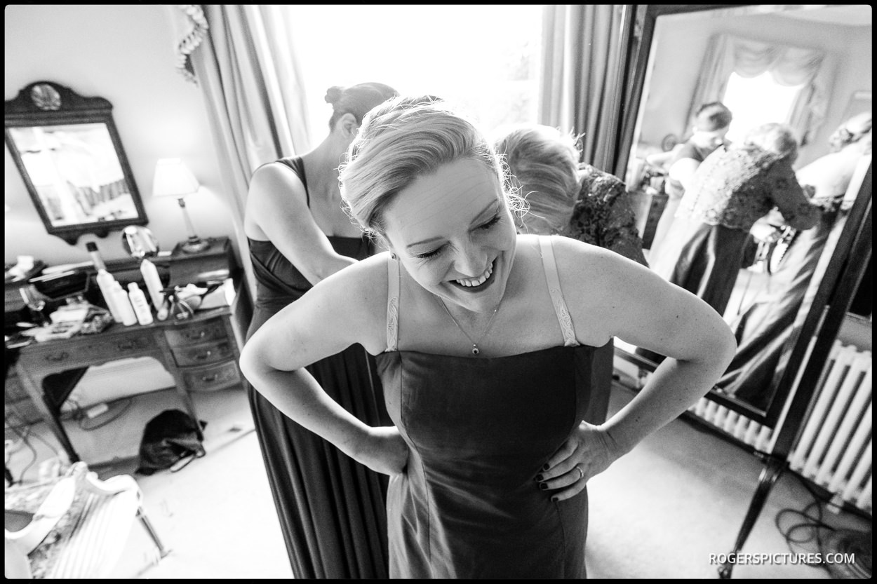 Bride prepares at North Cadbury Court wedding in Somerset