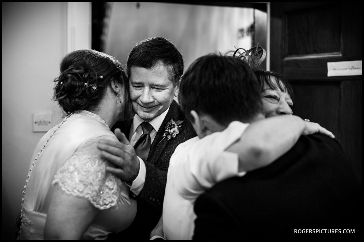 Signing the wedding register at St Etheldreda’s Church in London