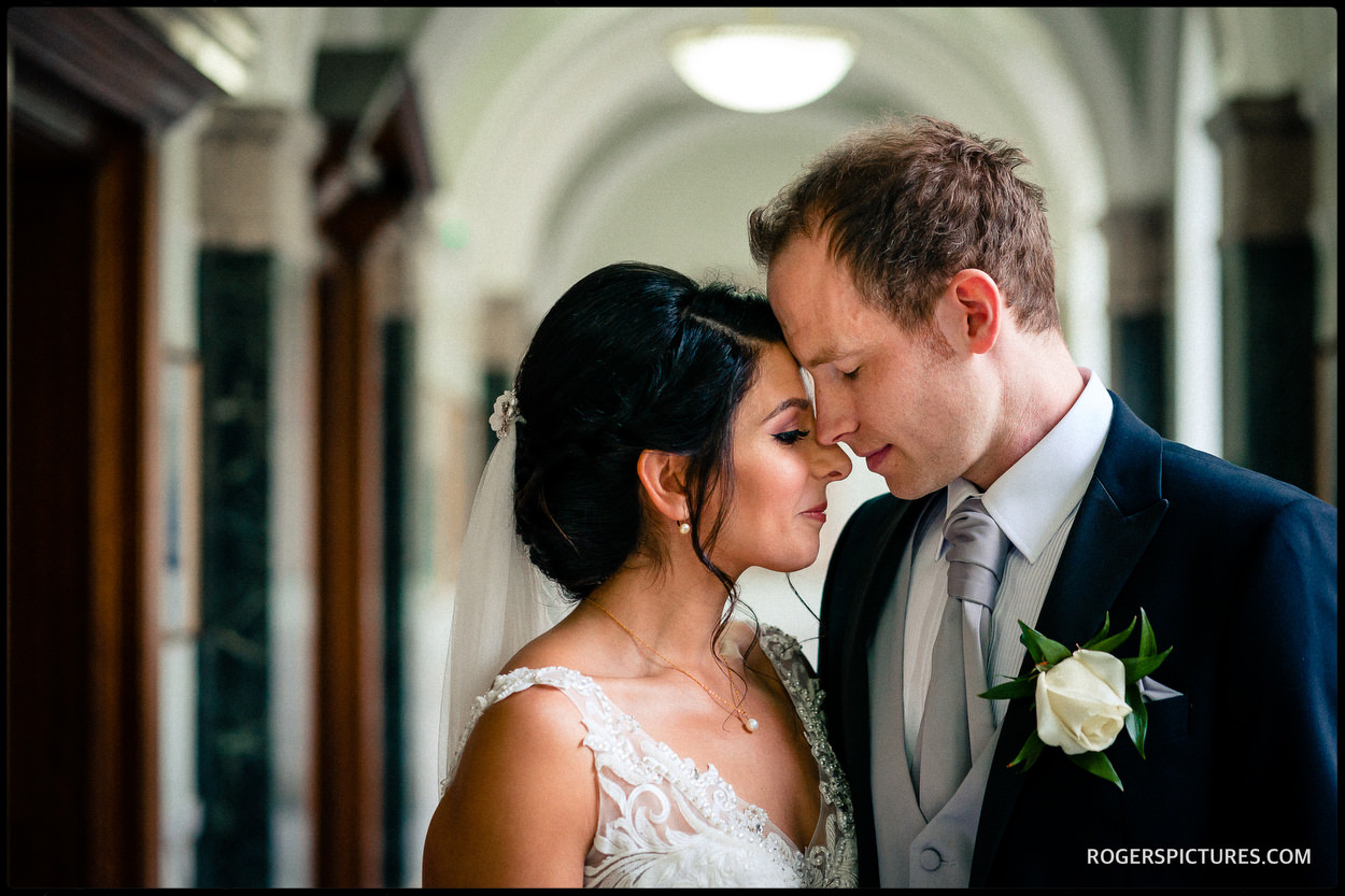 Portrait of bride and groom after a wedding ceremony at Islington Town Hall