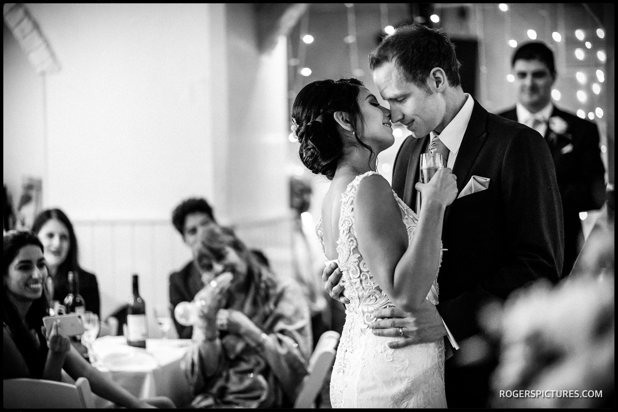 Unposed moment between bride and groom at a London wedding