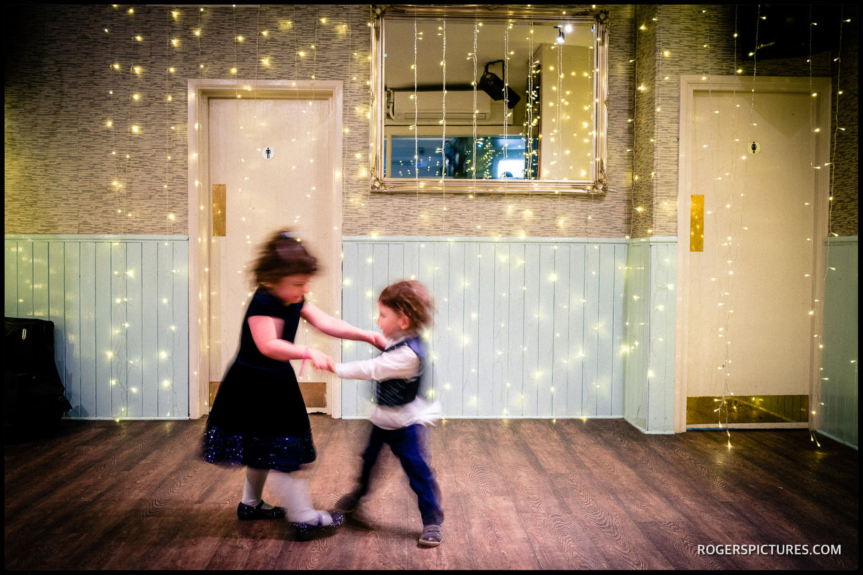 Documenting kids playing at a wedding in North London