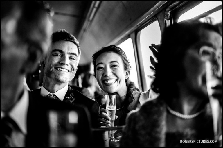 Cathy and George Married couple on London Bus after wedding at Islington Town Hall