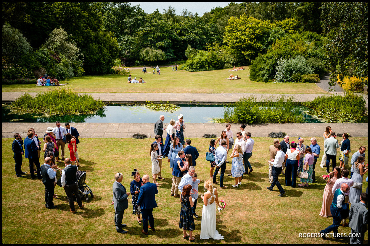 Guests at a wedding at the Hill Garden and Pergola in Hampstead