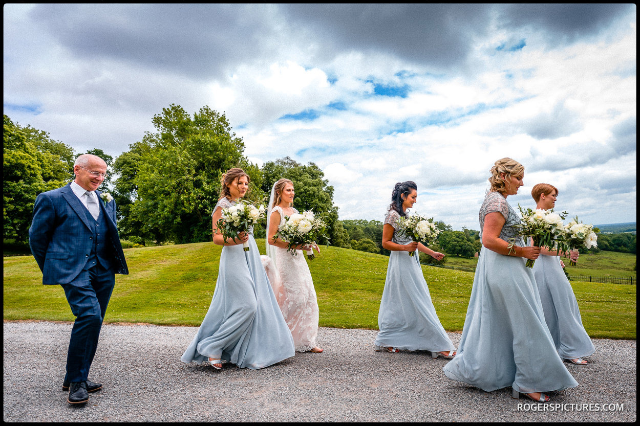 Bridesmaids escort the bride to church in Kent