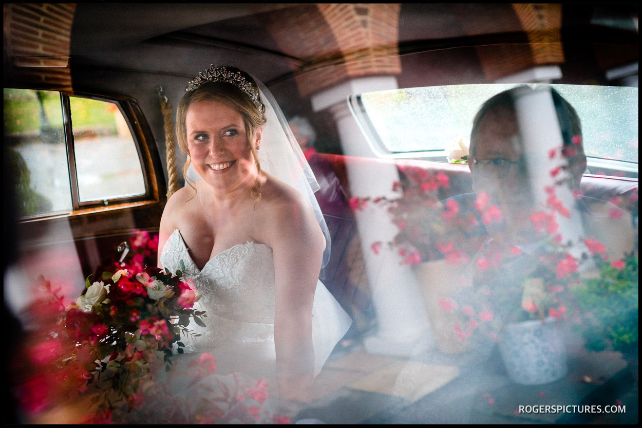 Bride in wedding car at St Anthony's RC Church in Slough