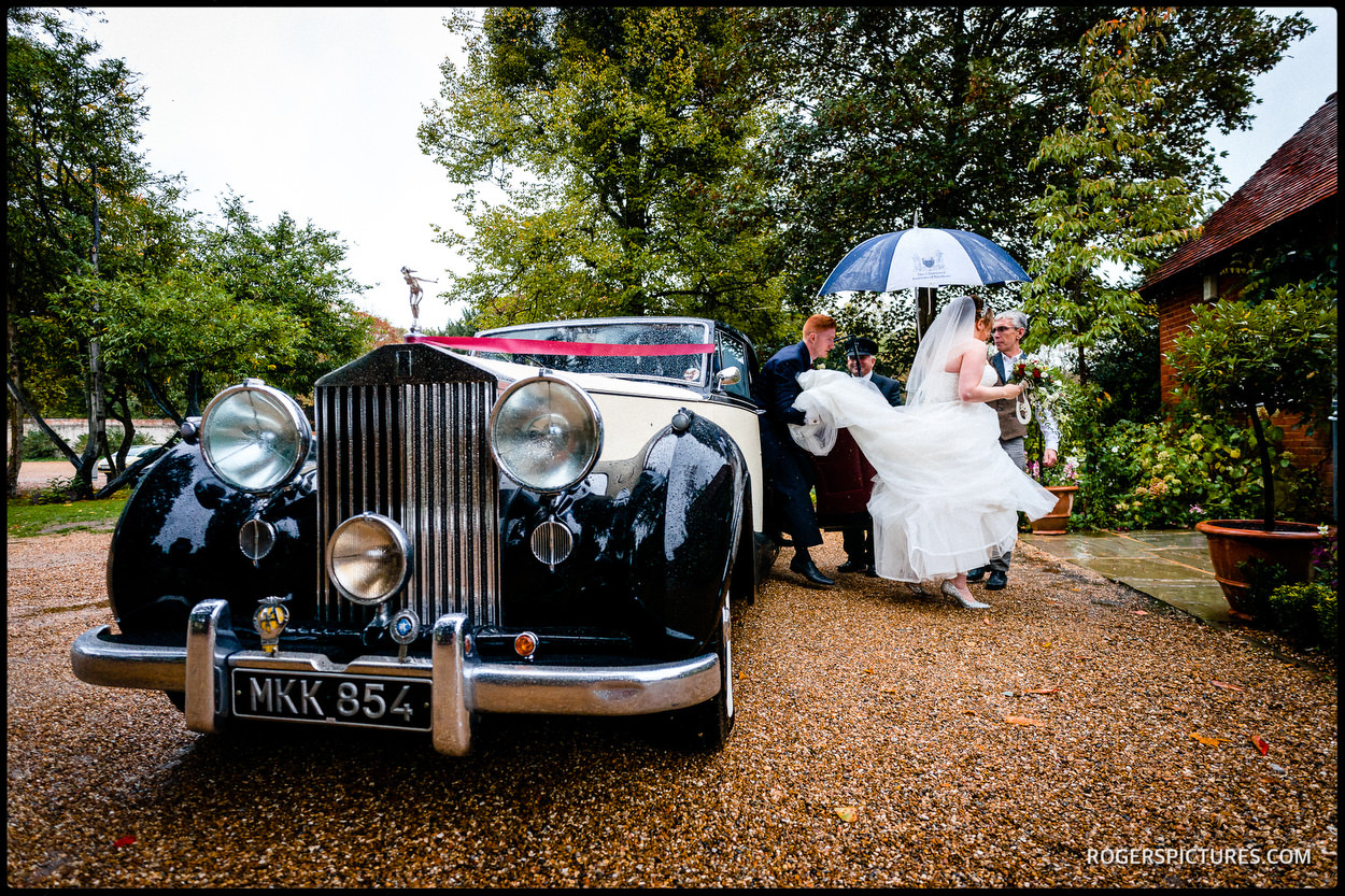 Wet wedding at Stoke Place Hotel in Buckinghamshire