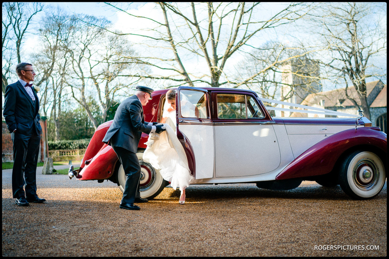 Bride and Father arrive in Rolls Royce at Hatfield House