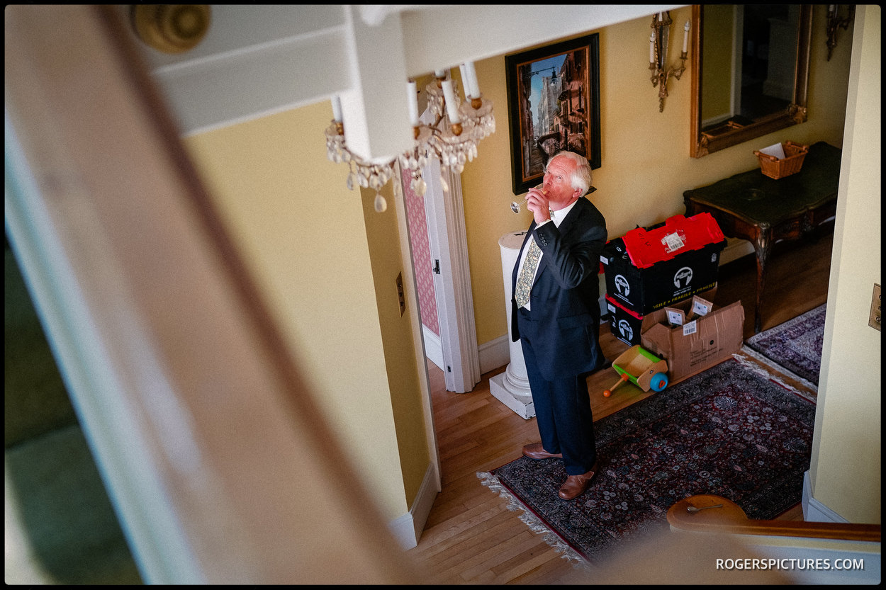 Father of the bride drinking champagne