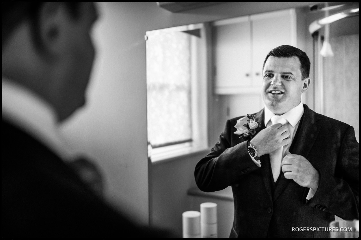 Groomsmen getting ready at Wadhurst Castle Cottage