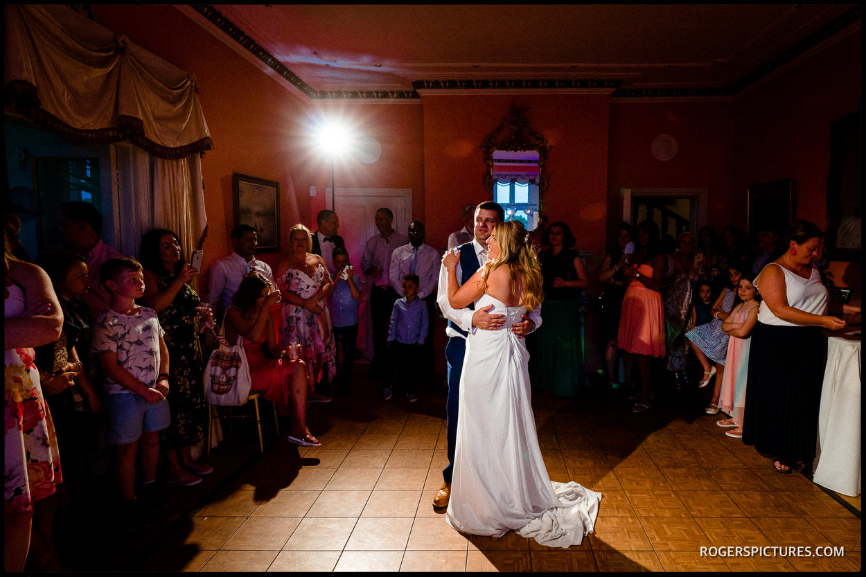 Bride and groom dancing at Wadhurst Castle in Sussex