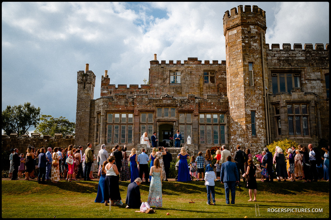 Outdoor wedding speeches at a castle