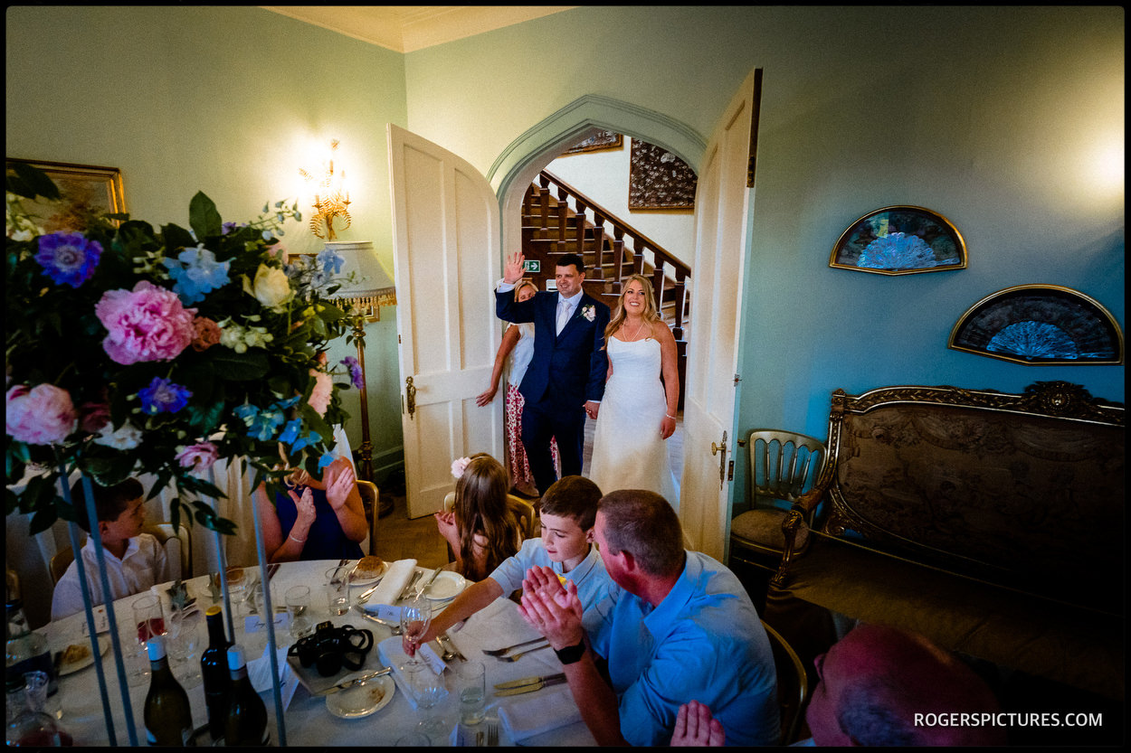 Entrance of the bride and groom to the wedding breakfast