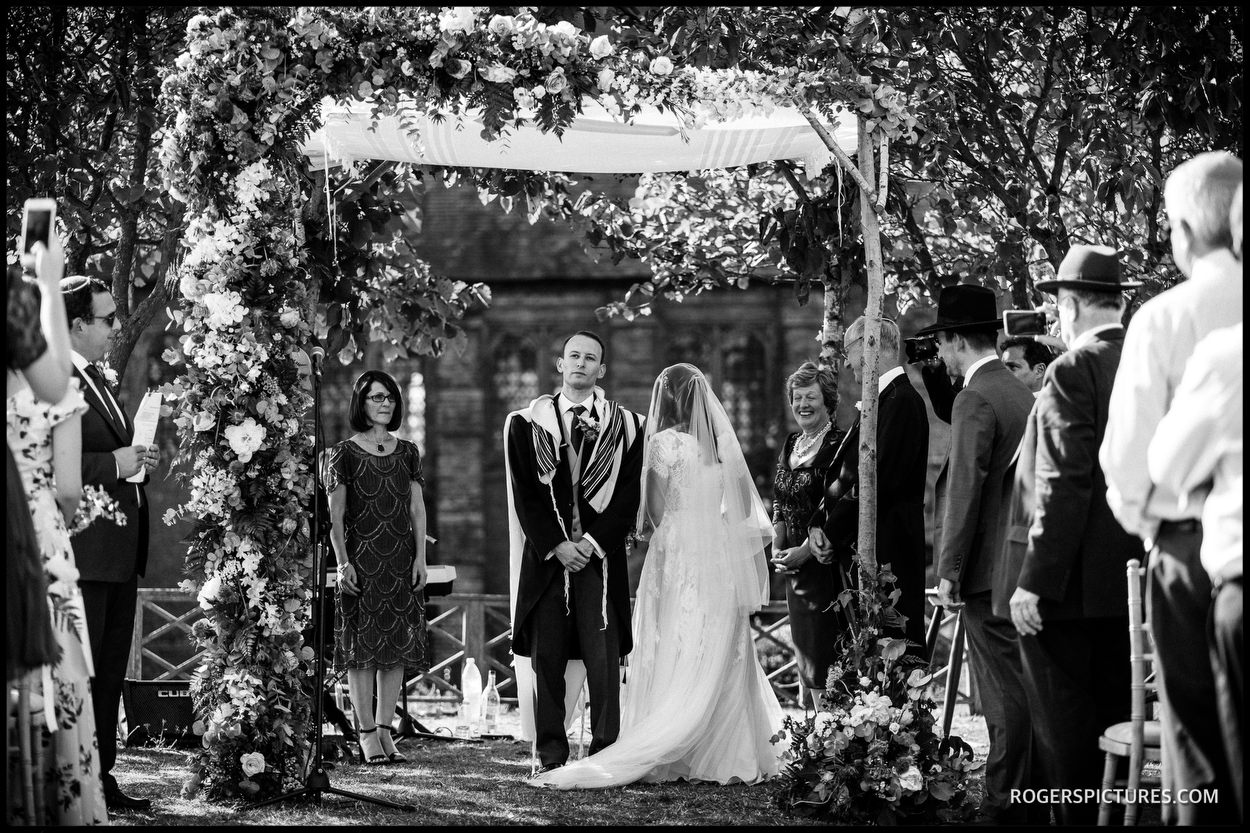 Circling the groom at Hatfield House Jewish wedding
