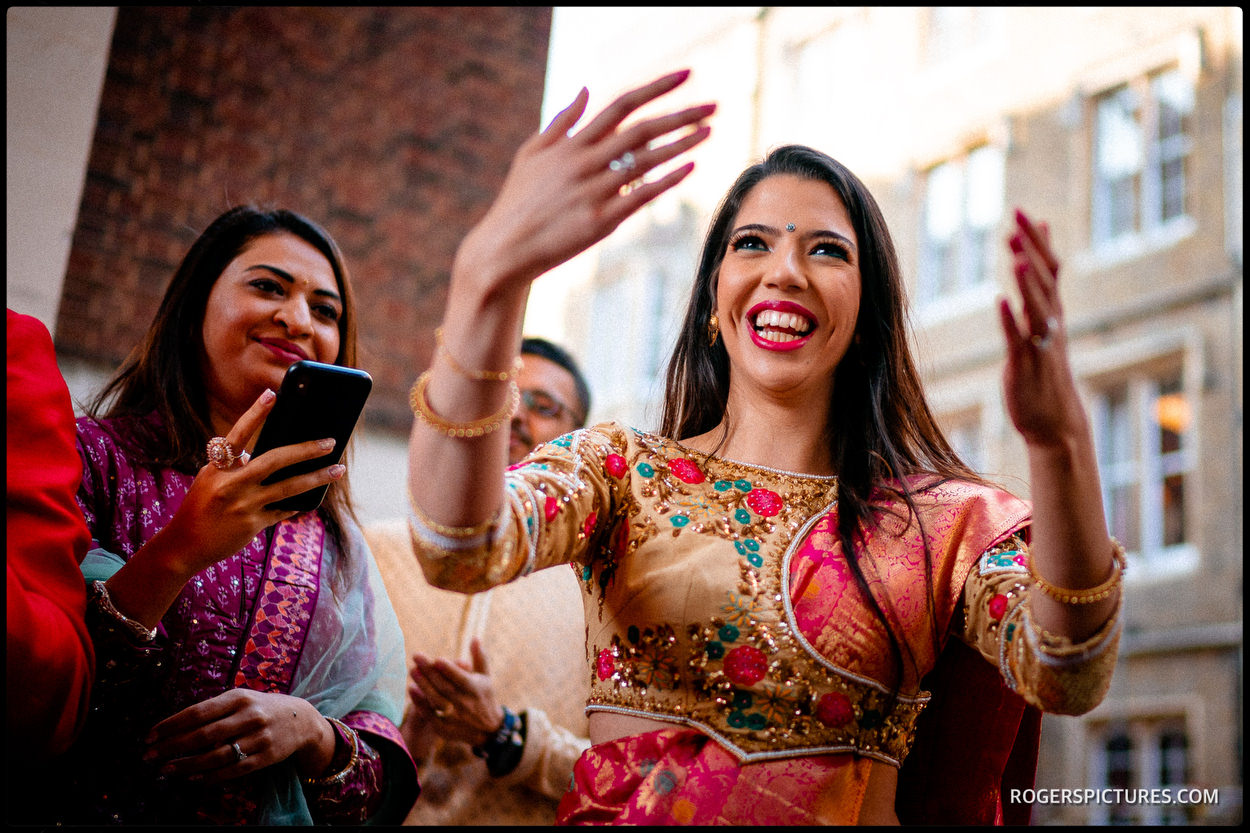 Dancing at Indian wedding in London