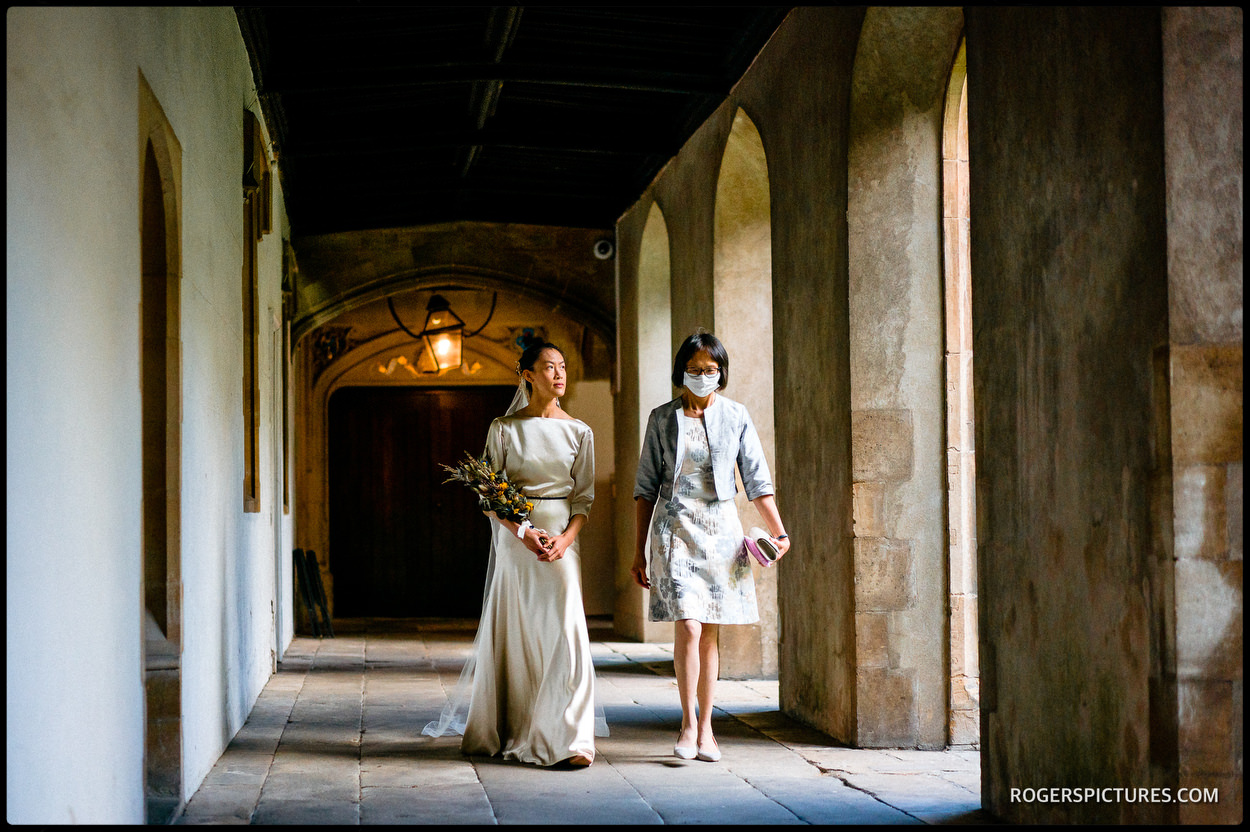 Bride in the cloisters at Jesus College in Cambridge